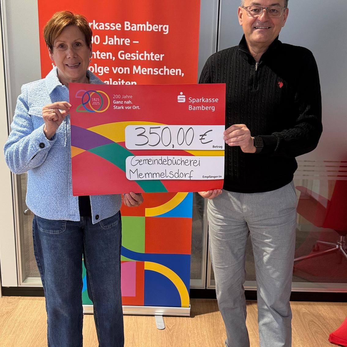 Übergabe des Spendenschecks